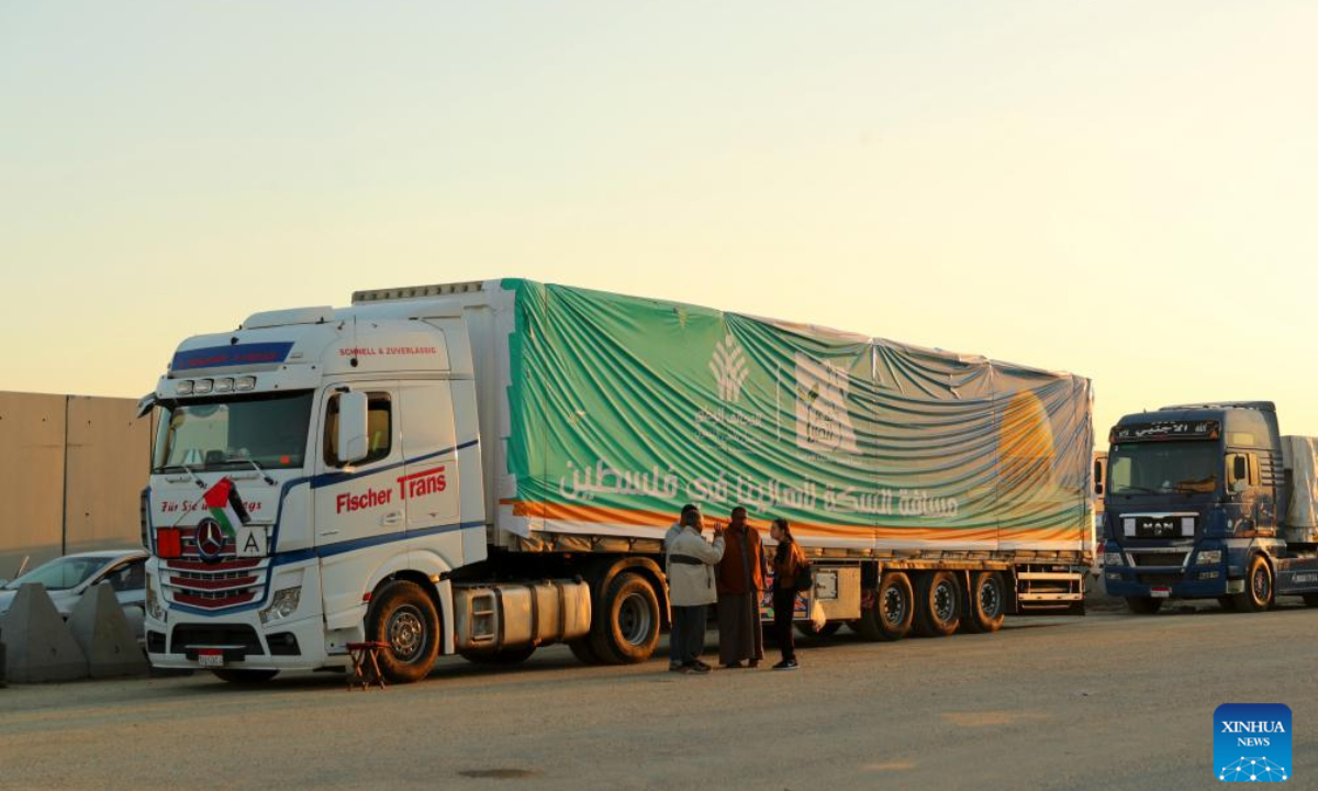 Trucks loaded with humanitarian aid wait to enter Gaza Strip on the Egyptian side of the Rafah crossing on Nov 30, 2023. A total of 2,781 trucks loaded with humanitarian aid have so far entered the Gaza Strip through the Rafah crossing, the only linking point between Egypt and the Palestinian enclave, Egypt's State Information Service (SIS) said Thursday. Photo:Xinhua