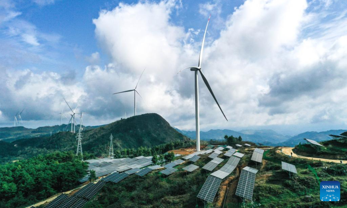 This aerial photo taken on Nov 16, 2023 shows the Dingdongpo wind power-photovoltaic project in Shiqian County of Tongren City, southwest China's Guizhou Province.  Photo:Xinhua
