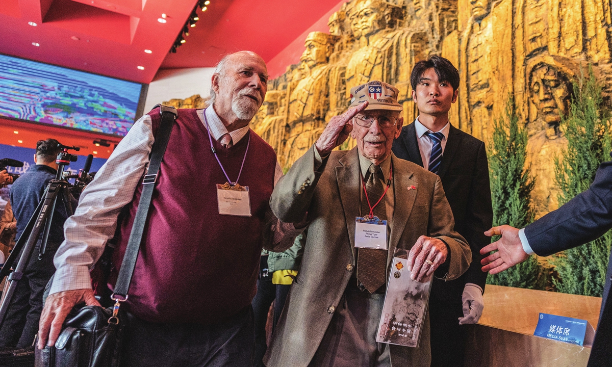 Flying Tigers veteran Melvin McMullen (middle) salutes to the camera at the ceremony to mark the 80th anniversary of US 14th Air Force's participation in China's War of Resistance against Japanese Aggression (1931-45) at the Museum of the War of the Chinese People's Resistance against Japanese Aggression in Beijing on October 30, 2023. Photo: Li Hao/GT 