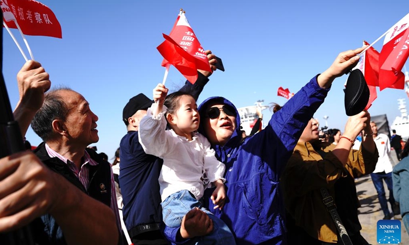 People see off China's 40th Antarctic scientific expedition team at a base dock in Shanghai, east China, Nov. 1, 2023. China's 40th Antarctic scientific expedition team set sail on Wednesday morning, starting a mission expected to last over five months. This is the first time China's Antarctic scientific research mission will be carried out by three ships.(Photo: Xinhua)