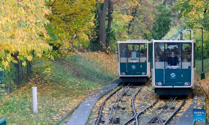 This photo taken on Nov. 1, 2023 shows two funicular cars on the Petrin hill in Prague, the Czech Republic. (Photo: Xinhua)
