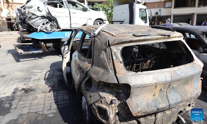 Vehicles are seen damaged in a rocket attack from Gaza on Oct. 31, in Ashdod, Israel, on Nov. 1, 2023. At least 8,525 Palestinians have been killed by Israeli strikes in Gaza since the beginning of the latest Israel-Hamas conflict starting from Oct. 7, according to the Gaza-based Health Ministry. Meanwhile, the Israeli military said the latest conflict has killed at least 1,400 people in Israel.(Photo: Xinhua)