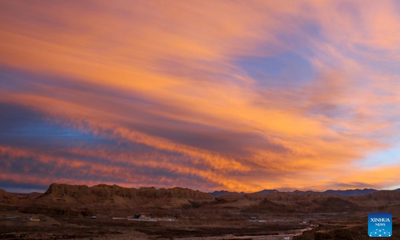 This photo taken on Nov. 3, 2023 shows the landscape of earth forest during dawn in Zanda County of Ngari Prefecture, southwest China's Tibet Autonomous Region. Zanda is famous for the unique landscape of earth forest. With gullies, ravines and steep mountainsides, the unique landscape was shaped as a result of gradual geological movements of the Himalayan region ever since the Quaternary Period from 2.5 million years ago and the impact of perennial water erosion and airslaking. (Photo: Xinhua)