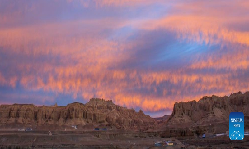 This photo taken on Nov. 3, 2023 shows the landscape of earth forest during dawn in Zanda County of Ngari Prefecture, southwest China's Tibet Autonomous Region. Zanda is famous for the unique landscape of earth forest. With gullies, ravines and steep mountainsides, the unique landscape was shaped as a result of gradual geological movements of the Himalayan region ever since the Quaternary Period from 2.5 million years ago and the impact of perennial water erosion and airslaking. (Photo: Xinhua)