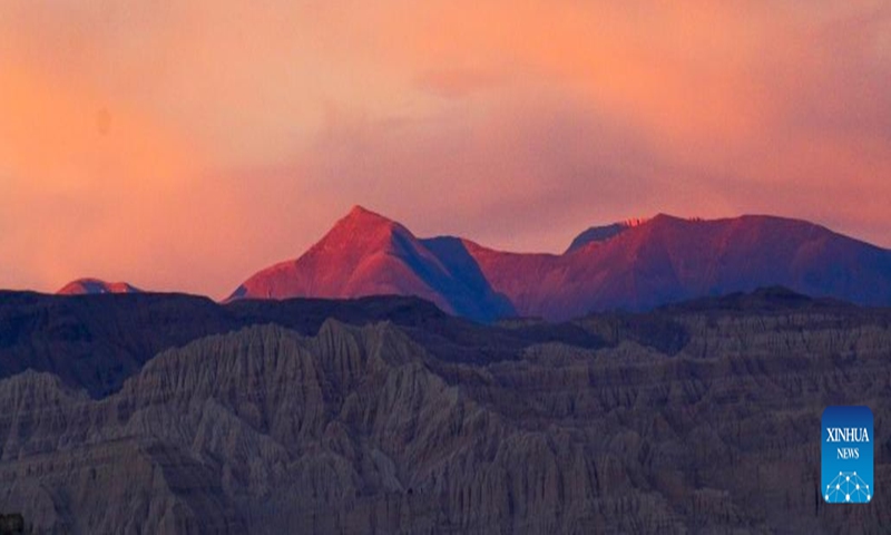 This photo taken on Nov. 3, 2023 shows the landscape of earth forest during dawn in Zanda County of Ngari Prefecture, southwest China's Tibet Autonomous Region. Zanda is famous for the unique landscape of earth forest. With gullies, ravines and steep mountainsides, the unique landscape was shaped as a result of gradual geological movements of the Himalayan region ever since the Quaternary Period from 2.5 million years ago and the impact of perennial water erosion and airslaking. (Photo: Xinhua)