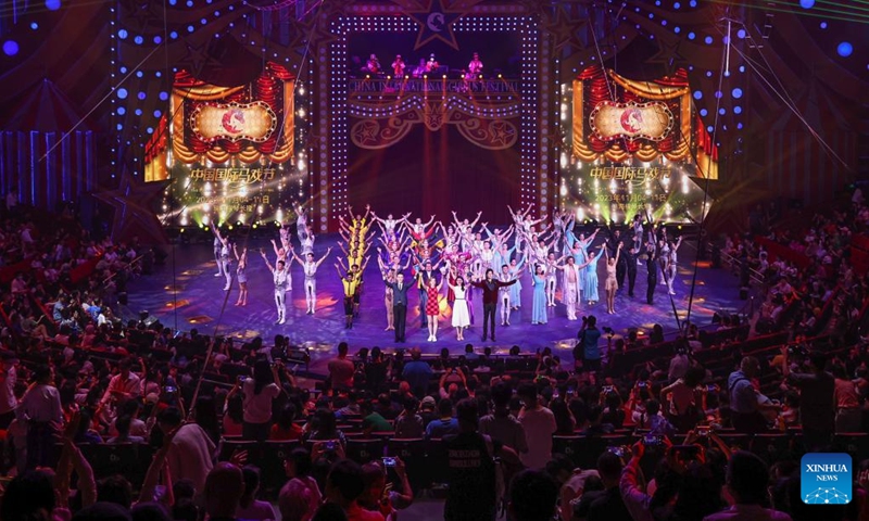Acrobats take their curtain call after a performance during the 7th China International Circus Festival in Zhuhai, south China's Guangdong Province, Nov. 5, 2023. Nearly 200 acrobats from 18 countries and regions participated in the event.(Photo: Xinhua)