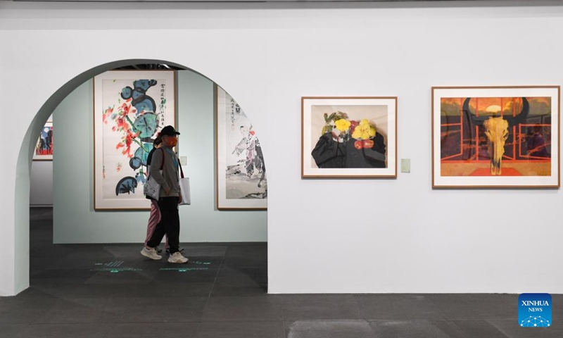 Visitors view exhibits at a new venue of Shenzhen Art Museum in Shenzhen, south China's Guangdong Province, Nov. 6, 2023. The new venue of Shenzhen Art Museum opened on Monday with a series of exhibitions set to open to the public the next day.(Photo: Xinhua)