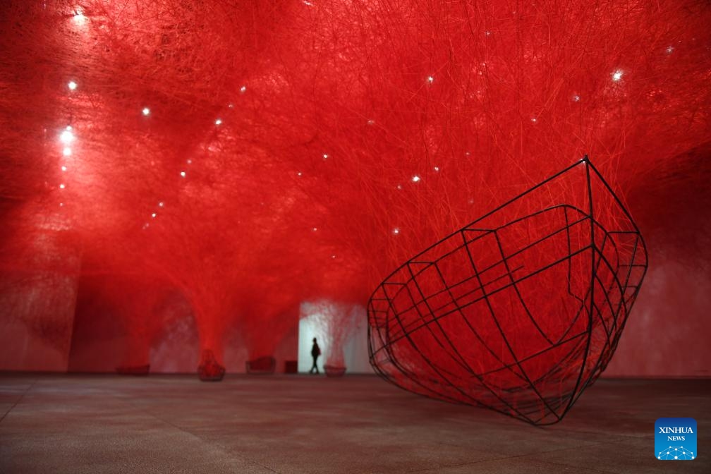 A visitor views an artistic work at a new venue of Shenzhen Art Museum in Shenzhen, south China's Guangdong Province, Nov. 6, 2023. The new venue of Shenzhen Art Museum opened on Monday with a series of exhibitions set to open to the public the next day.(Photo: Xinhua)