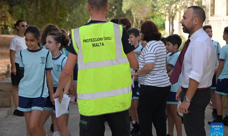 Students line up for evacuation during a tsunami response exercise in Marsaxlokk, Malta, on Nov. 7, 2023. Malta conducted the tsunami response exercise here on Tuesday, simulating a situation of widespread tsunami threat throughout the Eastern and Central Mediterranean.(Photo: Xinhua)