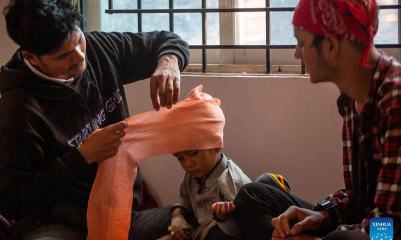 An earthquake survivor receives medical treatment at a hospital in Nepalgunj, Nepal, Nov. 7, 2023. A 6.4-magnitude earthquake hit Jajarkot and Rukum West districts in western Nepal on Friday night.(Photo: Xinhua)