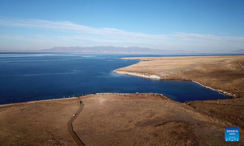 This aerial photo taken on Nov. 6, 2023 shows a view of Sayram Lake in Bortala Mongolian Autonomous Prefecture, northwest China's Xinjiang Uygur Autonomous Region. Sayram Lake is the largest and highest alpine lake in Xinjiang.(Photo: Xinhua)