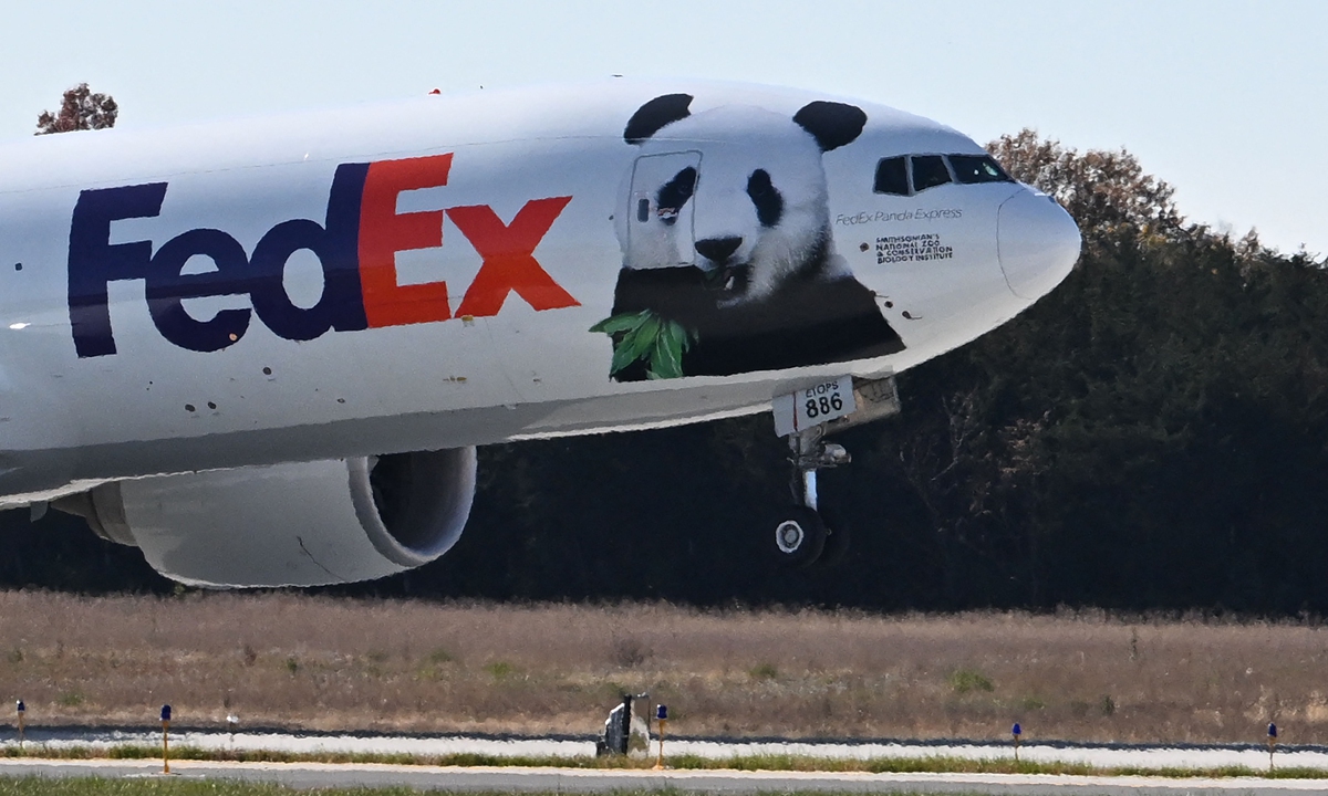 The Panda Express takes off as it transports Giant Pandas from the Smithsonian's National Zoo at Dulles International Airport in Dulles, Virginia, on November 8, 2023. All three of the zoo's pandas Mei Xiang, Tian Tian, and their male cub Xiao Qi Ji are leaving for China.Photo;VCG