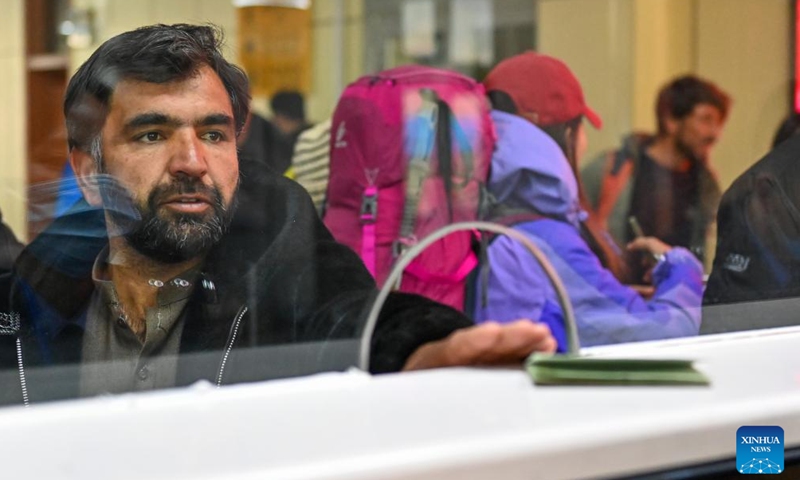 A traveler goes through border inspection at the Khunjerab Pass in Taxkorgan Tajik Autonomous County, northwest China's Xinjiang Uygur Autonomous Region, Nov. 6, 2023. (Photo: Xinhua)