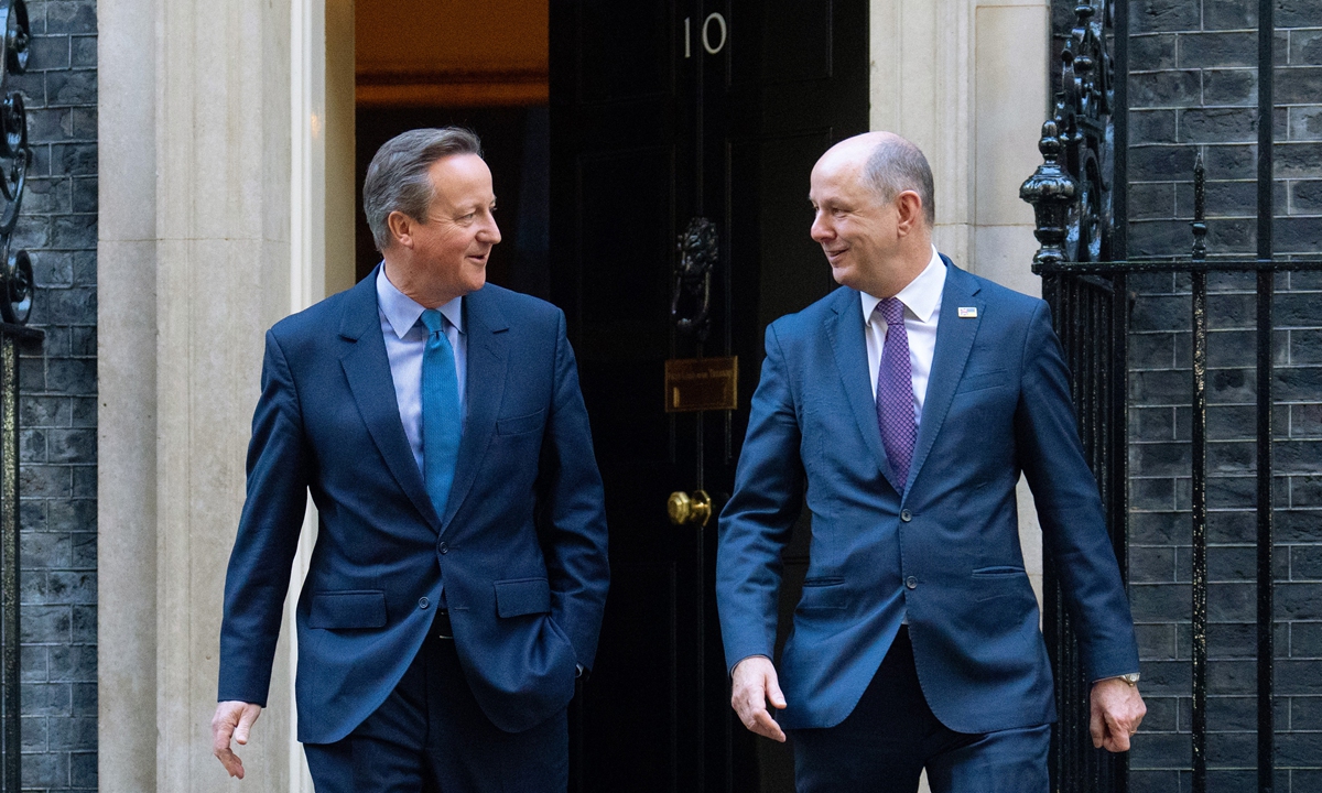 Former UK prime minister David Cameron (left) leaves 10 Downing Street with Sir Philip Barton, the permanent under-secretary of the Foreign, Commonwealth and Development Office, after being appointed Foreign Secretary in a Cabinet reshuffle on November 13, 2023 in London. Photo: VCG