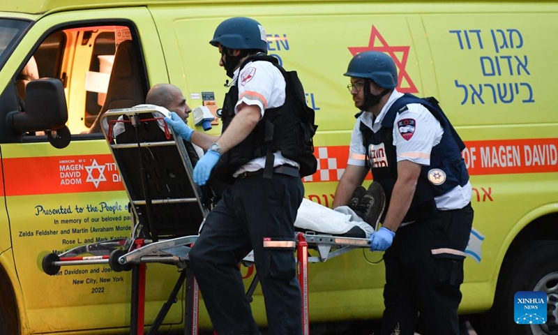 An injured man is transferred to hospital after an anti-tank missile fired from Lebanon hit Moshav Dovev in north Israel Nov. 12, 2023. Hezbollah leader Sayyed Hassan Nasrallah said on Saturday that the Iran-backed armed group would continue to pressure Israel from southern Lebanon by conducting military operations. (Photo: Xinhua)