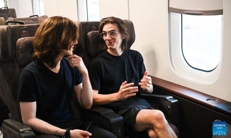 U.S. students participating in the China Education Tour sit inside a prototype locomotive using high-temperature superconducting (HTS) maglev technology in Chengdu, southwest China's Sichuan Province, Nov. 6, 2023. More than 20 young people from the United States participated in the China Education Tour in southwest China's Sichuan Province recently. (Photo: Xinhua)