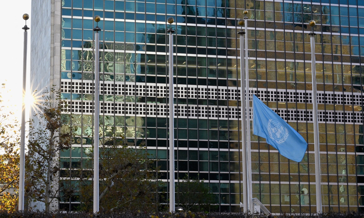 A UN flag flies at half-mast at the UN headquarters in New York on November 13, 2023. UN lowered the flags of its institutions all over the world for the 101 staff killed so far during the conflict in Gaza. Photo: AFP