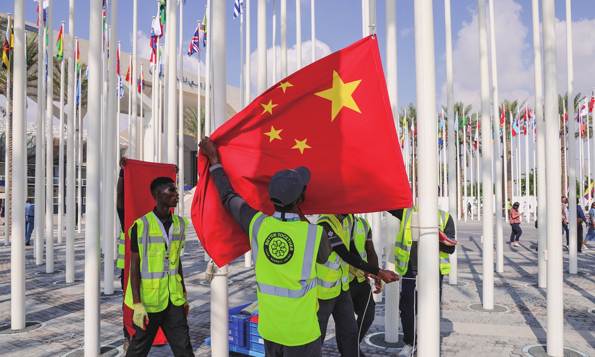 Flags of nations participating in the UNFCCC COP28 Climate Conference, including China, are hoisted a day before its official opening in Dubai, the United Arab Emirates, on November 29, 2023. Photo: VCG