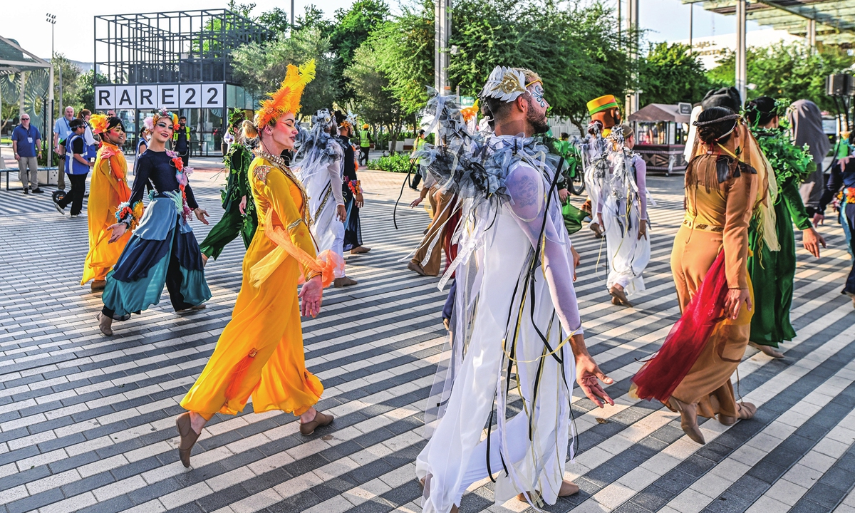 Performers are seen in costume at Expo City Dubai, the venue of COP28, on November 29, 2023. Photo: VCG