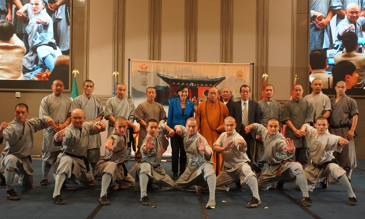 Shi Yongxin (back row, center), Abbot of the Shaolin Temple, poses for a photo with guests and participants of the 2023 North American Shaolin Games in Los Angeles, the US, on November 10, 2023. Photo: Courtesy of the Shaolin Temple