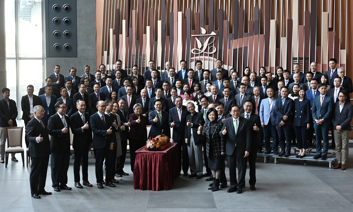 
Hong Kong Special Administrative Region (HKSAR) Chief Executive John Lee Ka-chiu (center) joins other HKSAR government officials and Legislative Council (LegCo) members to mark the 25th anniversary of the founding of the LegCo at the HKSAR Legislative Council Complex, China on November 17, 2023. Photo: VCG