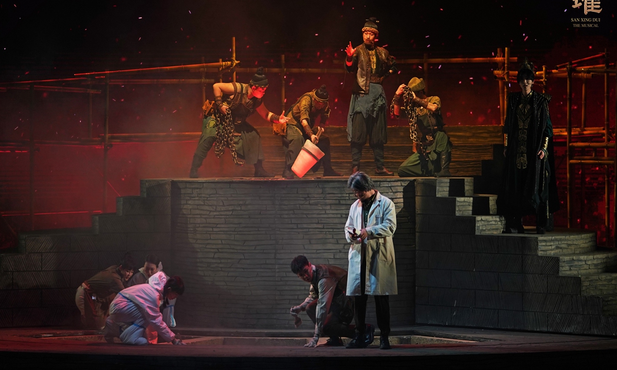 Actors and actresses perform on stage during Sanxingdui the Musical at the Tianqiao Performing Arts Center in Beijing on November 19, 2023. The new musical shares with the world one of the greatest 20th-century archaeological finds in China: the mysterious Sanxingdui Ruins in Southwest China's Sichuan Province. Photo: Courtesy of Tianqiao Performing Arts Center