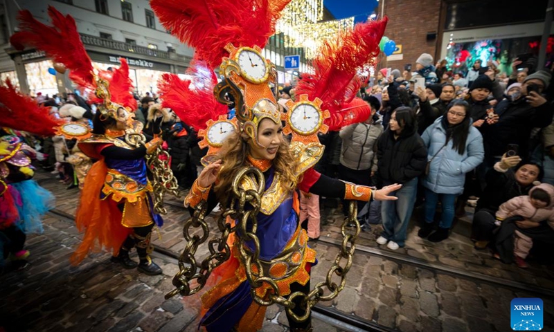 Artists perform during the Christmas opening celebration in Helsinki, Finland, Nov. 18, 2023. The Christmas opening celebration was held in central Helsinki on Saturday with a grand parade, marking the start of the festive season. (Photo: Xinhua)