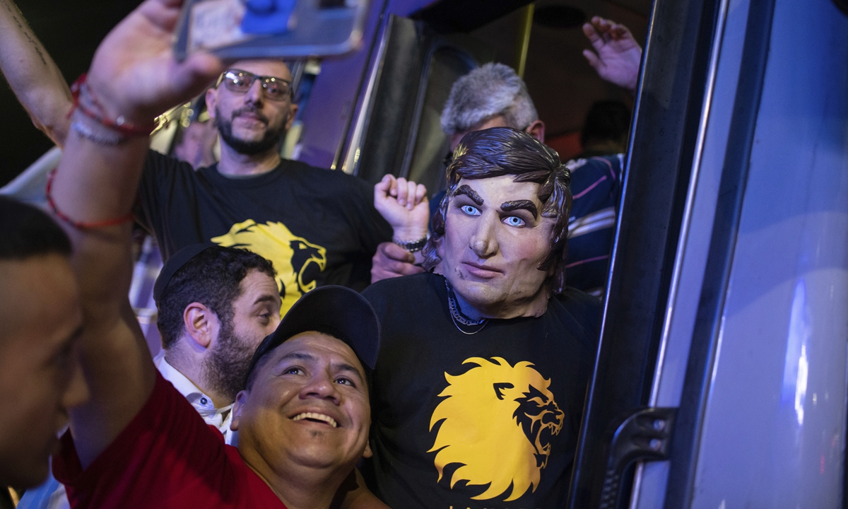Supporters of Javier Milei from the far-right Liberty Advances coalition celebrate after his victory in Argentina's presidential elections on November 20, 2023. Photo: from VCG.