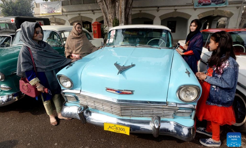 People visit a vintage and classic car show in Peshawar, Pakistan, Nov. 19, 2023. (Photo: Xinhua)
