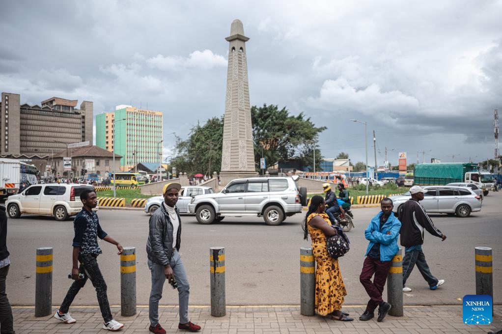 People walk in a street in Nairobi, capital of Kenya, Nov. 19, 2023.(Photo: Xinhua)