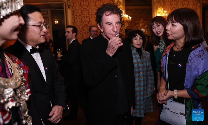 Former French Culture Minister Jack Lang tastes Moutai at the unveiling ceremony of LA LISTE 2024 world restaurant ranking at the French Ministry of Foreign Affairs in Paris, France, Nov. 20, 2023. LA LISTE 2024, the latest update of a list of the best global restaurants, was unveiled here on Monday.(Photo: Xinhua)