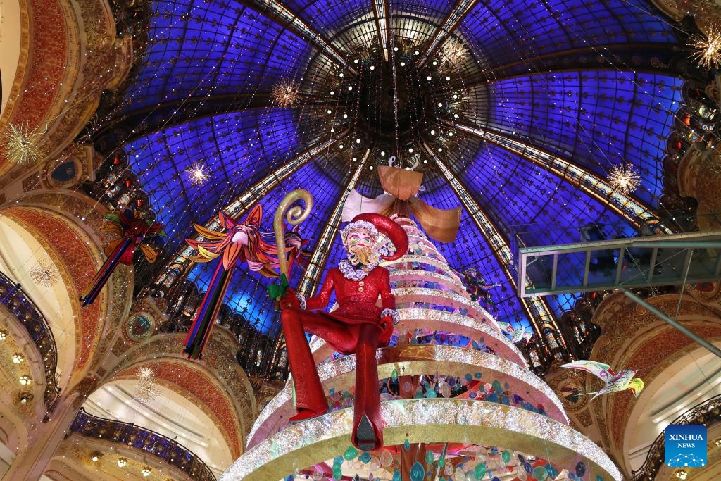 A giant Christmas tree is seen at the Galeries Lafayette department store in Paris, France, Nov. 21, 2023.(Photo: Xinhua)