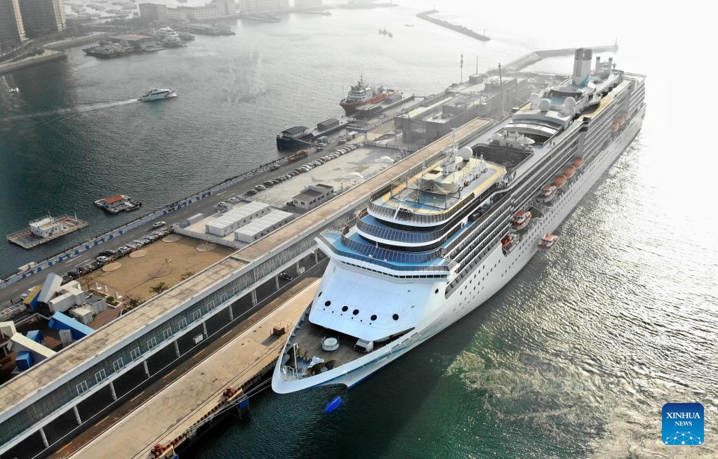 This aerial photo taken on Nov. 21, 2023 shows the cruise ship Mediterranea docked at Qingdao Cruise Terminal in Qingdao, east China's Shandong Province. Qingdao has been vigorously developing its cruise tourism service. As cruise voyages become increasingly frequent along with a climbing number of inbound tourists, they also contribute to the sustainable development of related sectors in the city. To date, Qingdao is connected by 40 international cruise lines to nearly 20 port cities.(Photo: Xinhua)