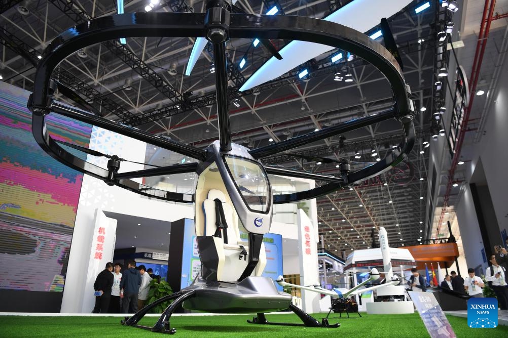 This photo taken on Nov. 23, 2023 shows an aircraft exhibited at the booth of Aviation Industry Corporation of China during the 2023 Aero Asia show in Zhuhai, south China's Guangdong Province. The 2023 Aero Asia show, co-organized by Zhuhai Airshow Co., Ltd. and German AERO Friedrichshafen, kicked off at the Zhuhai International Air Show Center on Thursday.(Photo: Xinhua)