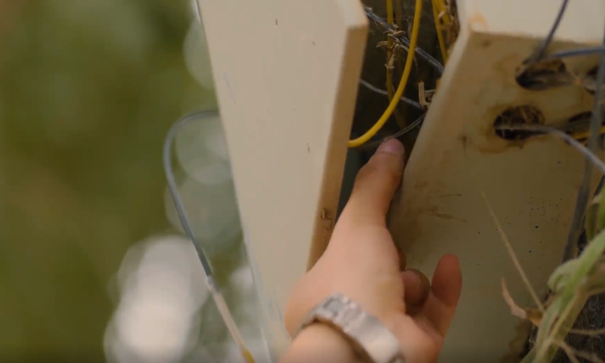 In the short movie released by China's Ministry of State Security on November 24, 2023, an overseas organization installed data collectors in a village in China's western border region for espionage purposes. Photo: snapshot from the short movie.