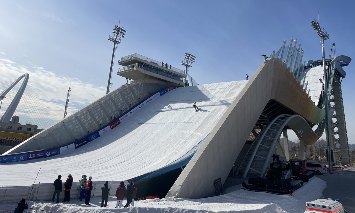 Athletes practice at Big Air Shougang, the venue for the big air freestyle snowboard and skiing events at the Beijing 2022 Winter Olympic Games, on November 28, 2023. Photo: Lu Wenao/GT