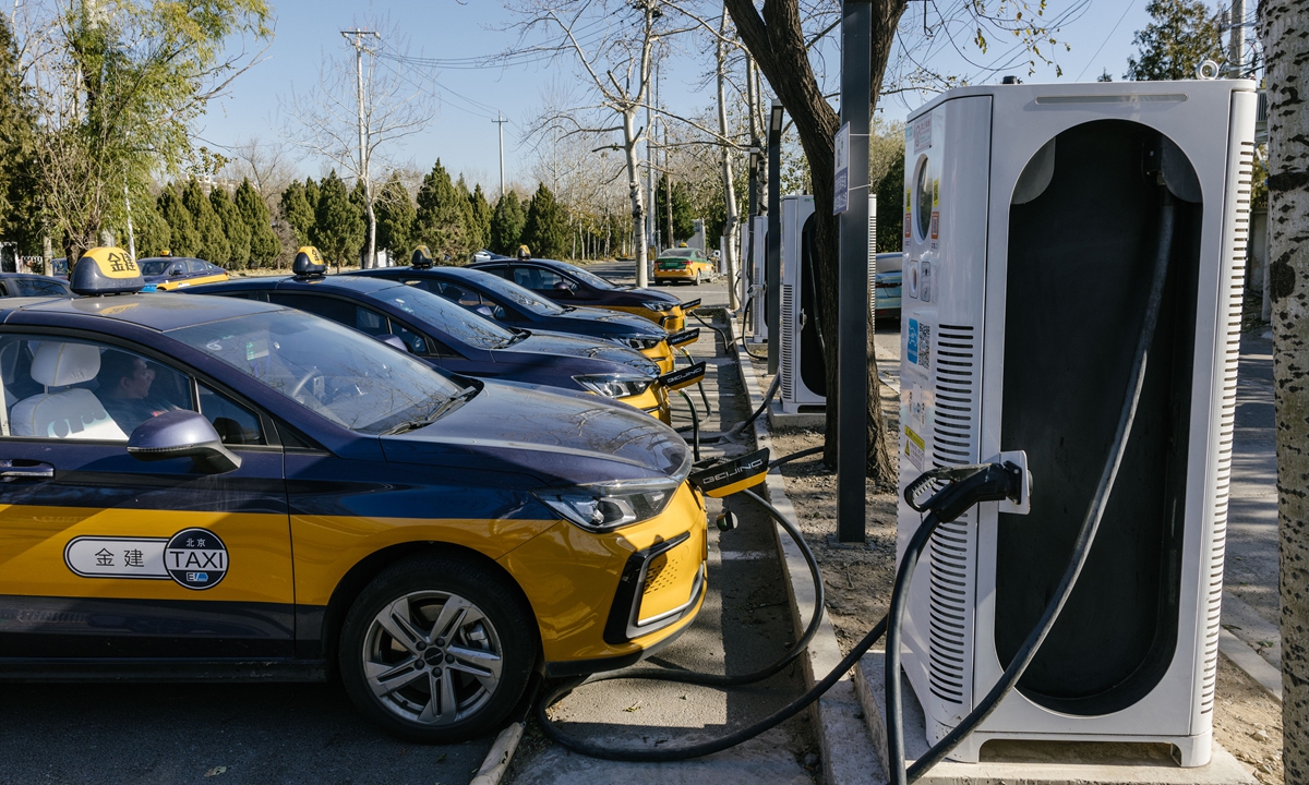 Some taxis are charging their batteries at a battery station in Fengtai district, Beijing on November 24, 2023. Photo: Li Hao/GT