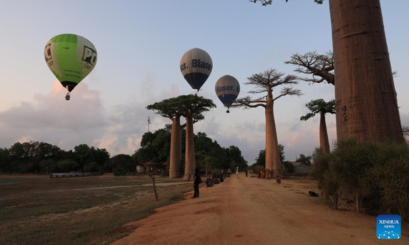 Hot air balloons take flight in Morondava, Madagascar, Nov. 25, 2023. (Photo: Xinhua)