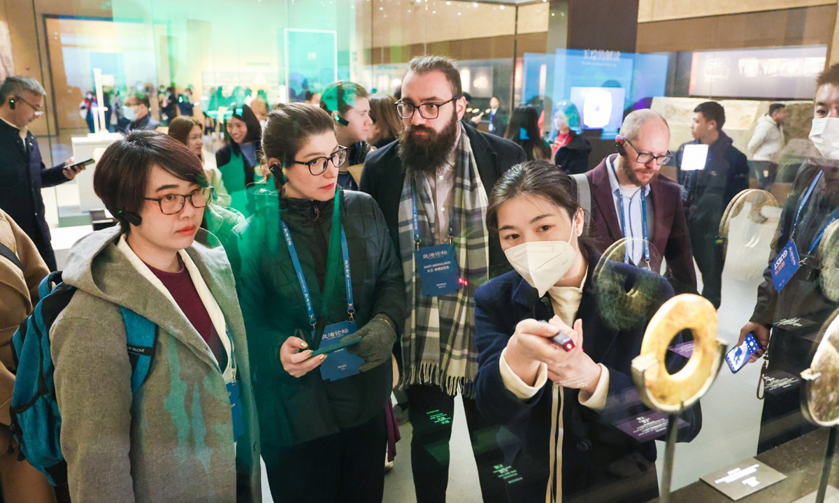 Guests of the Liangzhu Forum explore an exhibition at the Liangzhu Museum in Hangzhou, East China's Zhejiang Province, on December 1, 2023. Photo: Courtesy of the Liangzhu Forum