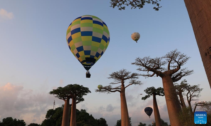Hot air balloons take flight in Morondava, Madagascar, Nov. 25, 2023. (Photo: Xinhua)