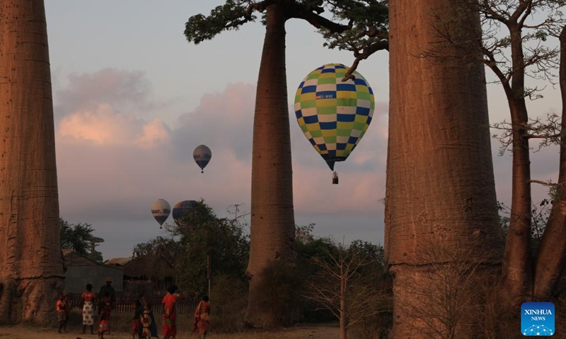 Hot air balloons take flight in Morondava, Madagascar, Nov. 25, 2023. (Photo: Xinhua)