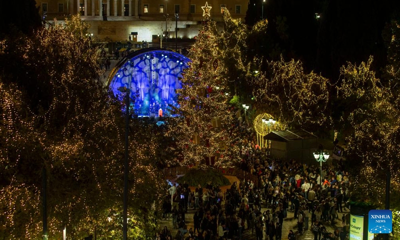 People attend a lighting ceremony for the holiday season at Syntagma Square in Athens, Greece, on Nov. 23, 2023. The holiday season kicked off in Athens with a tree lighting ceremony on Thursday. (Photo: Xinhua)