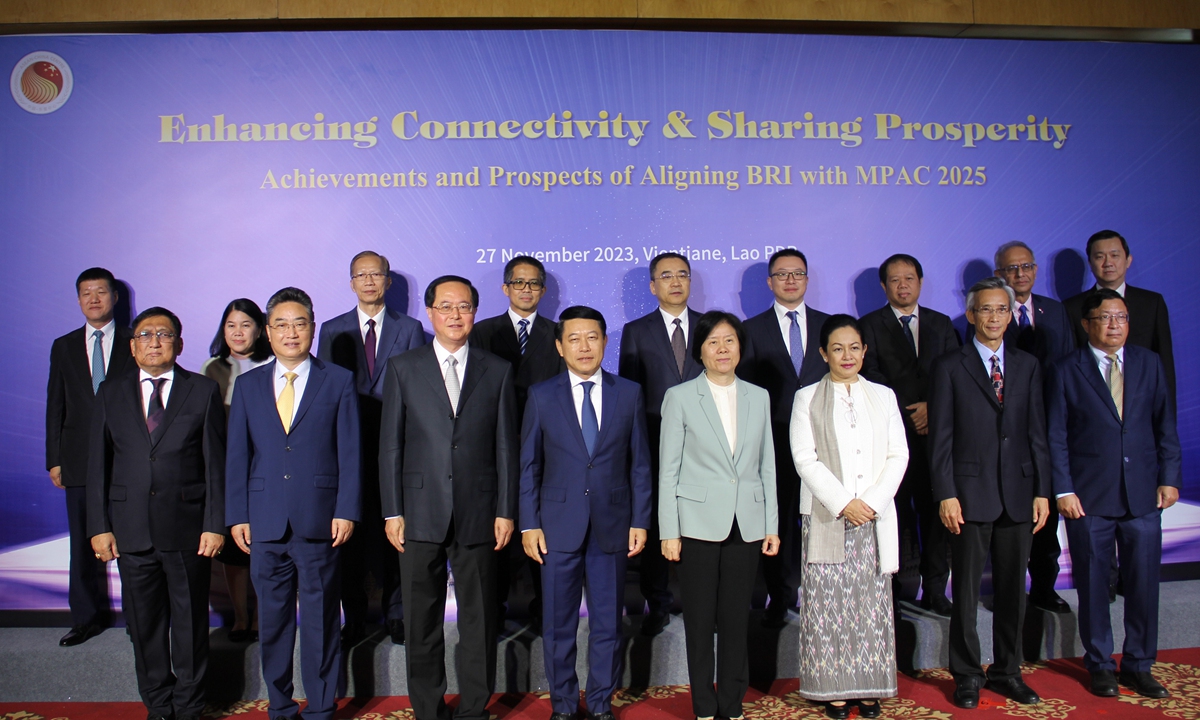 Officials from China and ASEAN members pose for pictures before the opening of a BRI-themed forum hosted by the ASEAN-China Center in Vientiane, Laos, on November 27, 2023. Photo: Wang Qi/GT