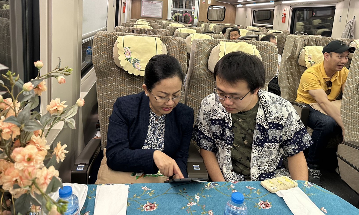 Myanmar's Union Minister for Hotels and Tourism Thet Thet Khine talks with Global Times reporter in an exclusive interview on November 28, 2023, during a trip from Vientiane to Luang Prabang, Laos, through the China-Laos railway. Photo: Courtesy of ASEAN China Center