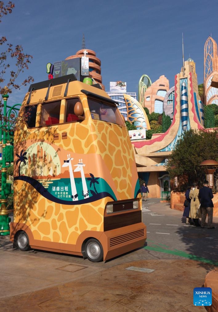 This photo taken on Nov. 29, 2023 shows a taxi at the Zootopia land in Shanghai Disney Resort of east China's Shanghai. The world's first Zootopia land, scheduled to open to the public starting from Dec. 20 at Shanghai Disney Resort, has kicked off trial operation, the resort said Wednesday.(Photo: Xinhua)