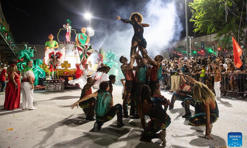 Performers from Grande Rio samba school participate in the samba parade at Cidade do Samba in Rio de Janeiro, Brazil, Dec. 2, 2023. A two-day event was held here to celebrate Brazil's National Samba Day which falls on Dec. 2. (Photo: Xinhua)
