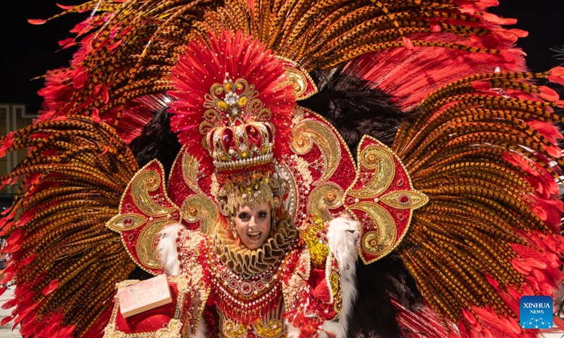 A performer from Salgueiro samba school participates in the samba parade at Cidade do Samba in Rio de Janeiro, Brazil, Dec. 2, 2023. A two-day event was held here to celebrate Brazil's National Samba Day which falls on Dec. 2. (Photo: Xinhua)