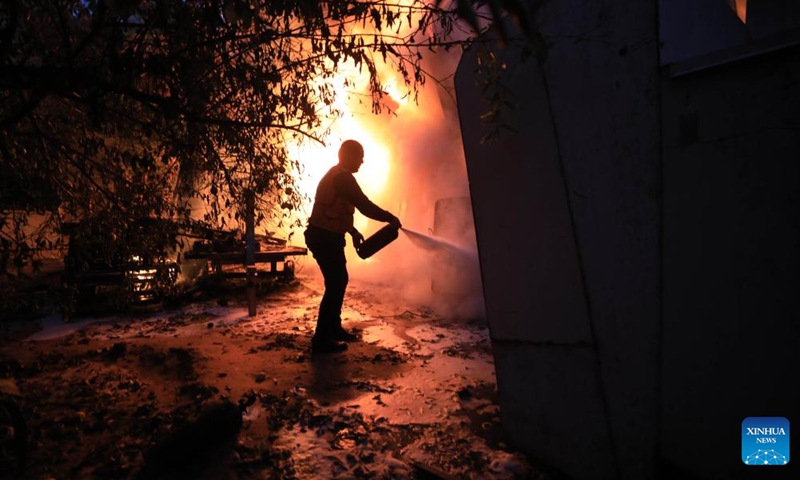 A plastic factory is on fire after Israeli attacks in the southern Gaza Strip city of Khan Younis Dec. 2, 2023. (Photo: Xinhua)