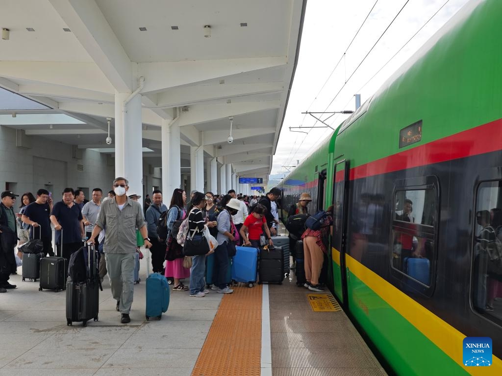 Passengers queue at Luang Prabang railway station of the China-Laos Railway in Luang Prabang, Laos, Dec. 4, 2023. (Photo: Xinhua)
