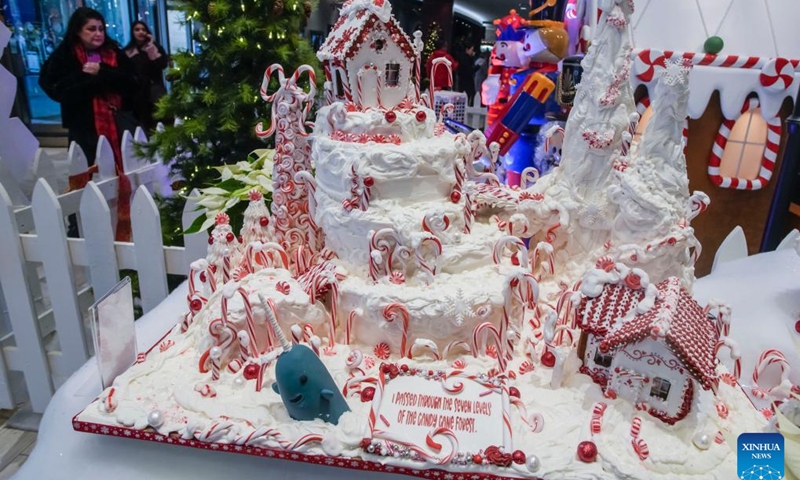 A gingerbread house is displayed at a Gingerbread Lane event in Vancouver, British Columbia, Canada, on Dec. 5, 2023. Over 30 gingerbread houses are displayed during the annual event.(Photo: Xinhua)